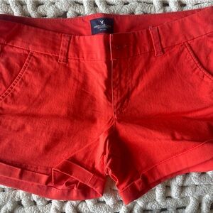 AMERICAN EAGLE ORANGE MIDI STRETCH SHORTS SIZE 8